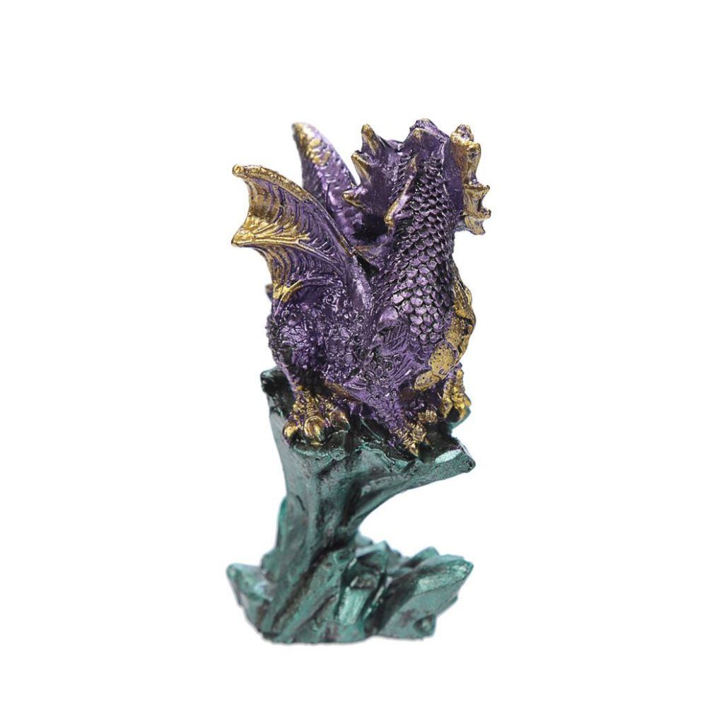 Enchanted Nightmare Dragon Mini Rock Crystal  This Enchanted Nightmare Dragon Mini Rock Crystal is a one-of-a-kind piece. It captures the unique and powerful presence of a dragon that is frozen in time. The intricate details and delicate craftsmanship make this piece a true treasure.