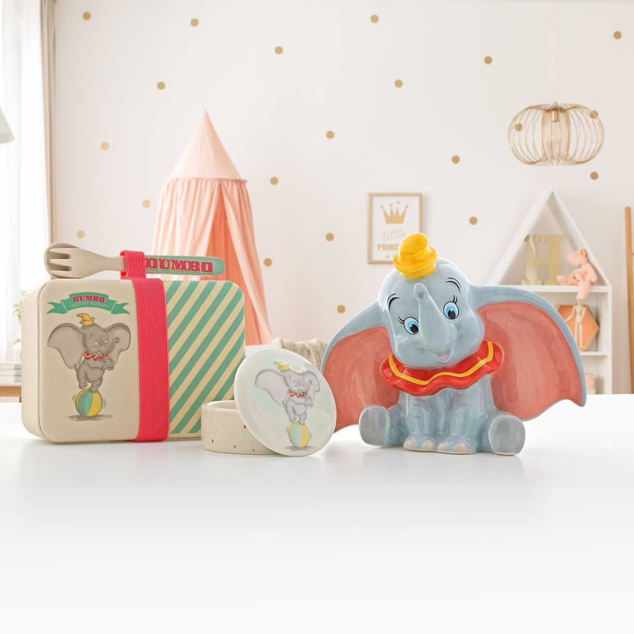 Enchanting Disney Collection Dumbo Money Bank This delightful and charming Dumbo shaped money bank would make an ideal christening or new baby gift. Dumbo is featured with his famous, giant floppy ears.