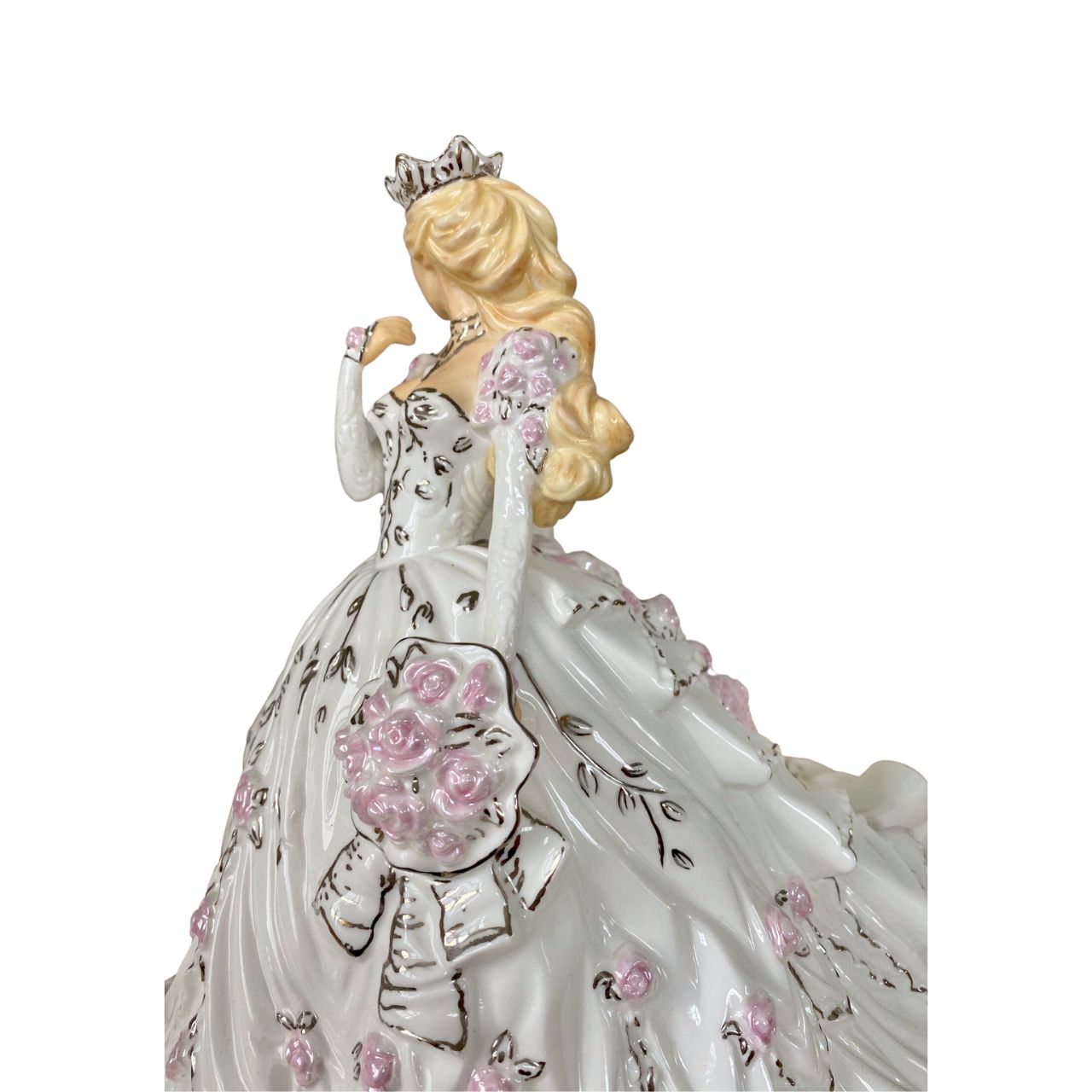 Gypsy Rose Blonde by English Ladies Company Thelma Madine’s stunning gown is recreated in this elegant bone china figurine. Floral details spill down the back of the dress and across the shoulders; with real platinum highlights adding the finishing touches.