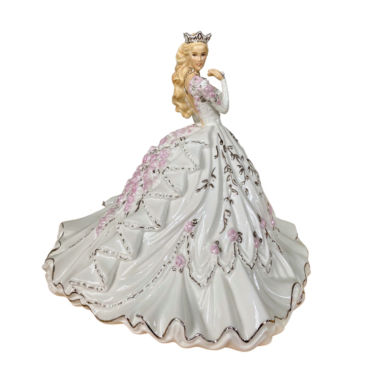 Gypsy Rose Blonde by English Ladies Company Thelma Madine’s stunning gown is recreated in this elegant bone china figurine. Floral details spill down the back of the dress and across the shoulders; with real platinum highlights adding the finishing touches.