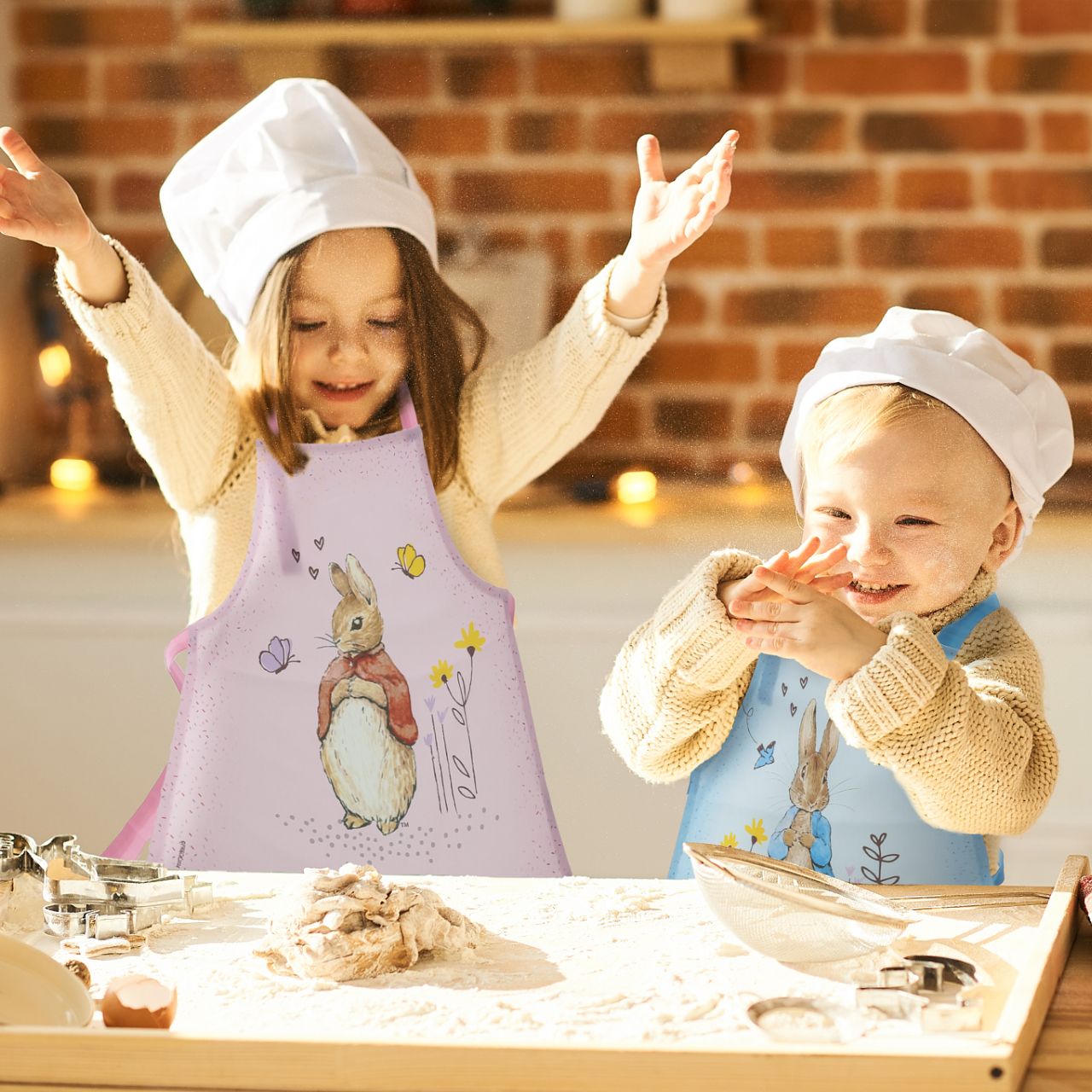 Introducing the delightful Flopsy Bunny apron, designed to make every cooking or crafting adventure a memorable one. Crafted with a super soft, wipeable fabric, it ensures easy clean-up, while the hook & loop tape fastening on the neck tie offers extra safety and comfort for your little one.
