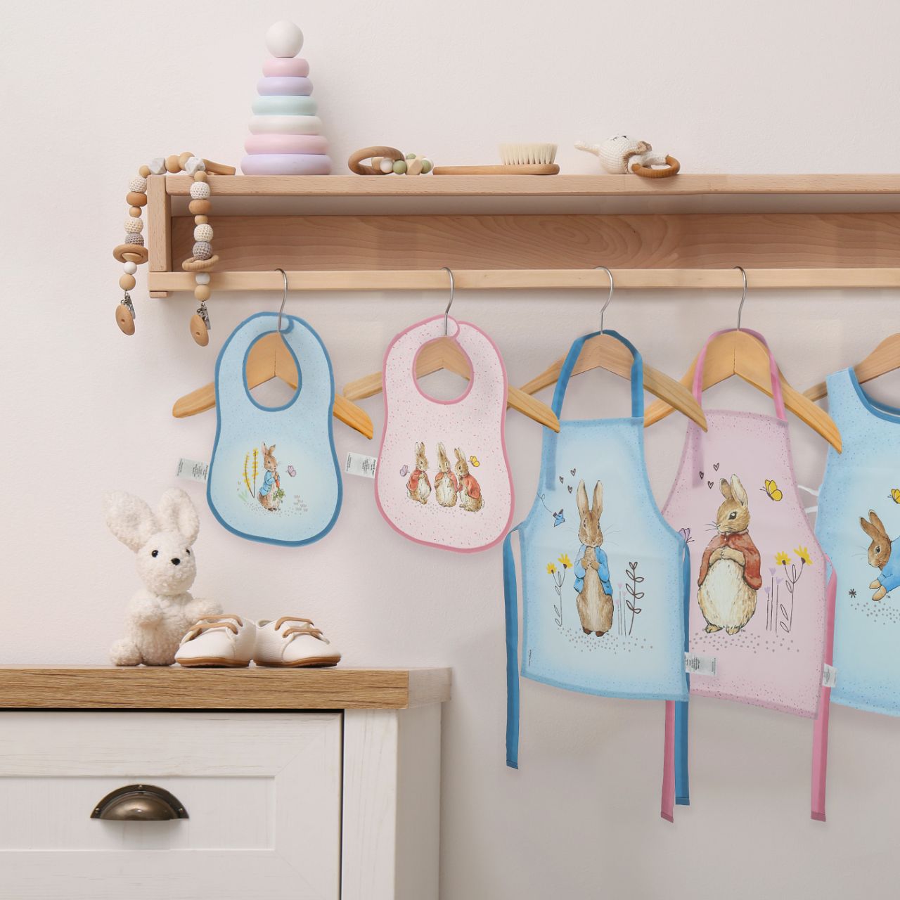 Introducing the delightful Flopsy Bunny Bib Set, inspired by the charming tales of Peter Rabbit and friends. This enchanting set of two bibs ensures mealtime is both stylish and mess-free. Crafted with super-soft, wipeable fabric, each bib features an easy hook & loop tape fastening for quick changes.
