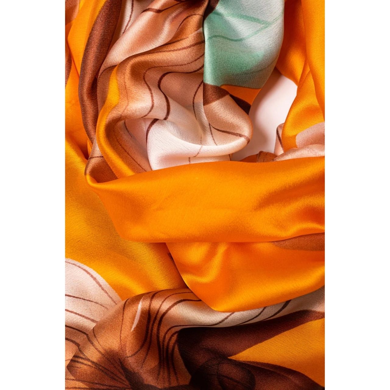 Bright Orange & Lotus Flower Polyester Scarf by Galway Crystal Our Bright Orange & Lotus Flower Polyester Scarf is the perfect rich colour that will draw attention and complement any outfit. This rich, soft and comfortable scarf is a must have and also comes in a beautiful box ready for gifting. A touch of luxury for everyday life and perfect for all seasons.