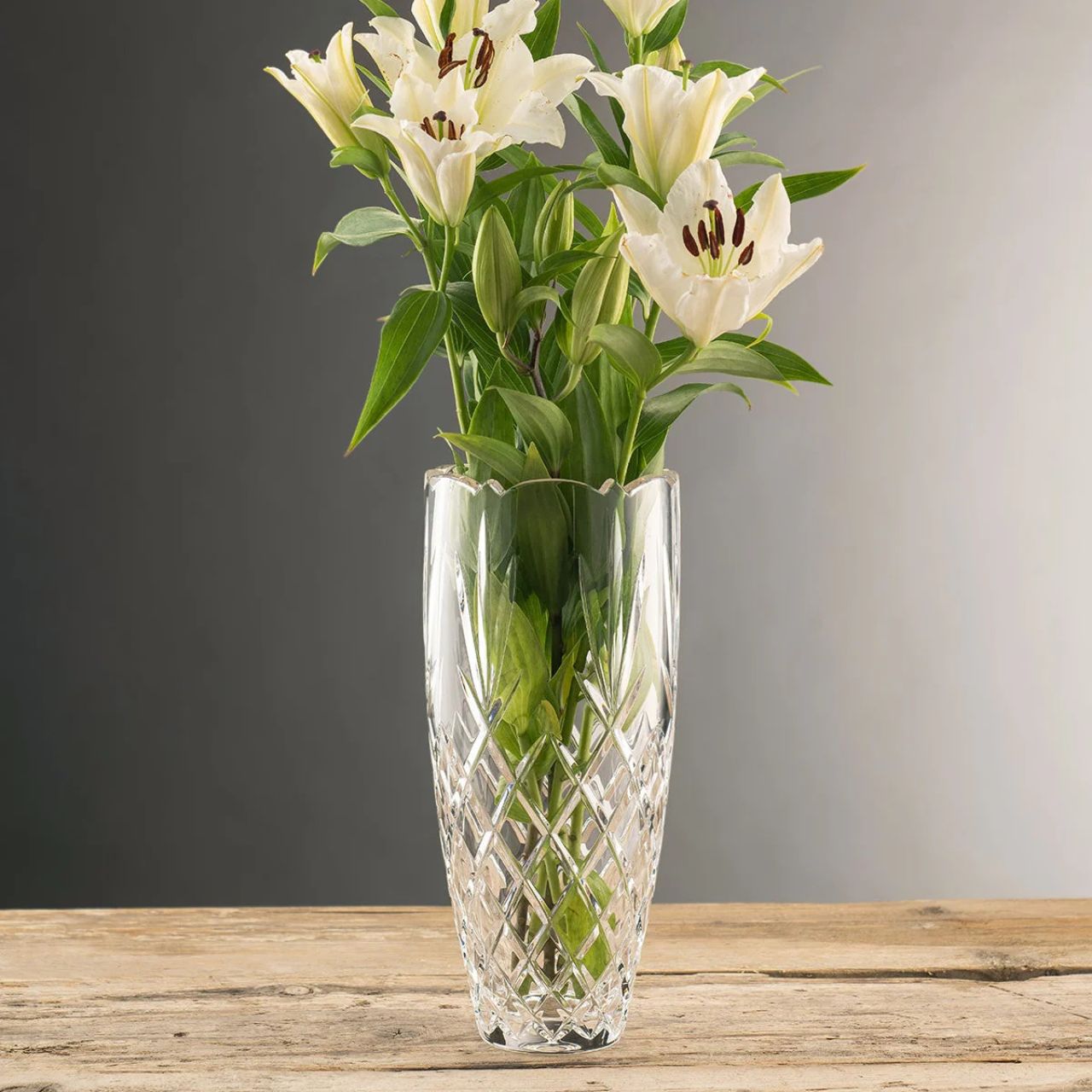 A tall cylinder shaped vase are ideal for long stemmed flowers such as your roses, lilies and sunflowers. Our Renmore 12" is simply stunning with its's heavy cut pattern which makes this a stand out piece.