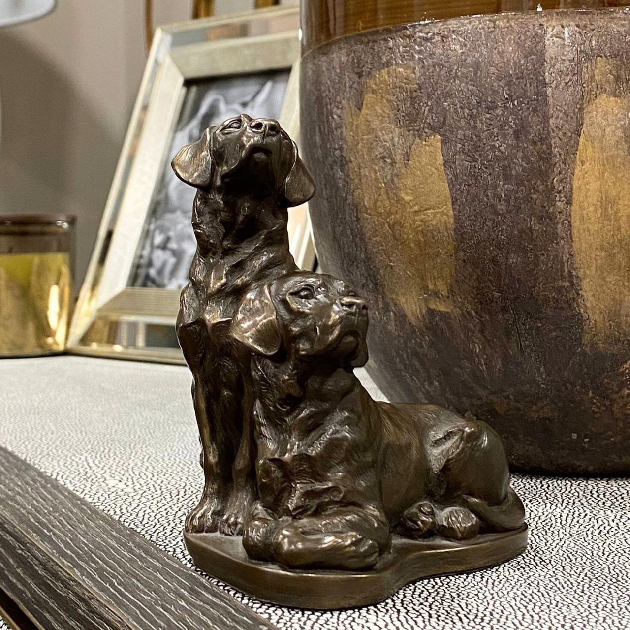 Pair of Labradors sculpture by Genesis Ireland. Bronze coloured and beautifully crafted. this is the perfect gift for the dog lover in your life.