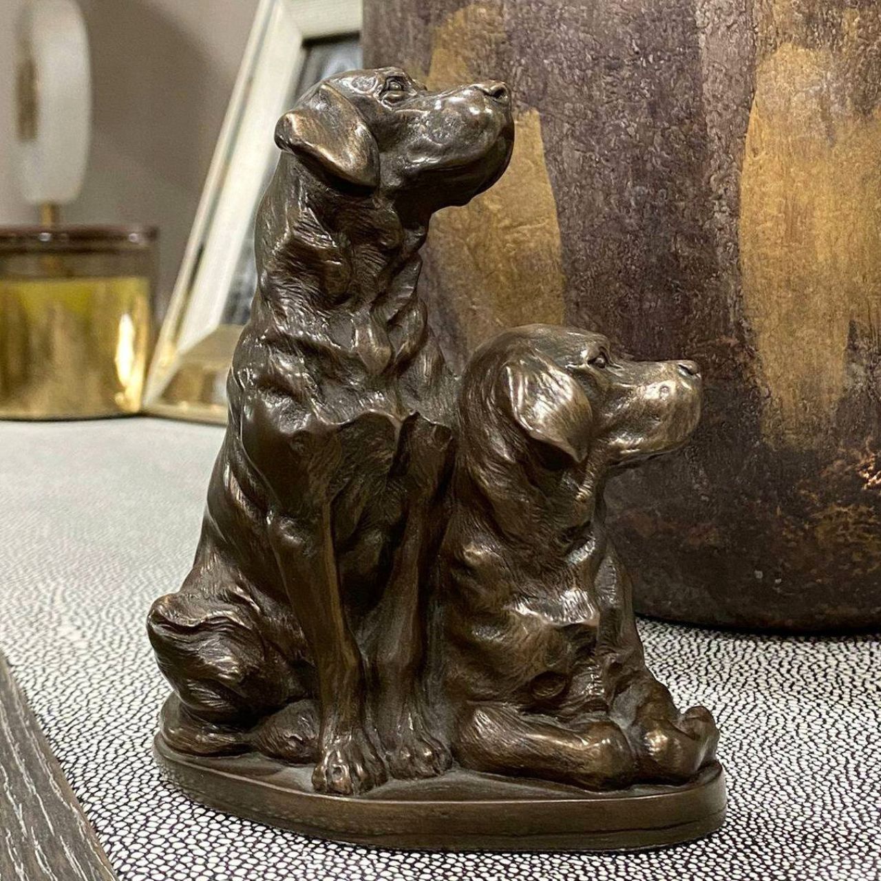 Pair of Labradors sculpture by Genesis Ireland. Bronze coloured and beautifully crafted. this is the perfect gift for the dog lover in your life.