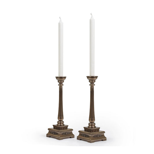 This exquisite duo isn't just an addition to your home; it's a statement of opulence. Meticulously crafted with unparalleled attention to detail, these candle holders exude an aura of unparalleled luxury and refinement. Their presence instantly elevates any setting, be it adorning a mantle, or console, or gracing a lavish dining table.