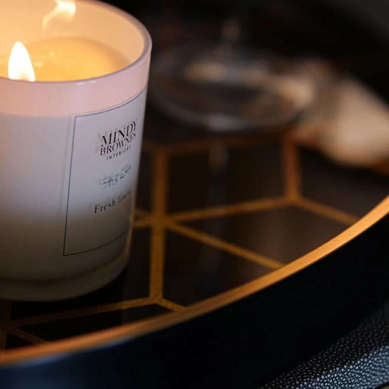 Mindy Brownes Geometric Trays Set of 2 A stunning set of two oval trays in midnight blue, with a gold rim and modern geometric prints.