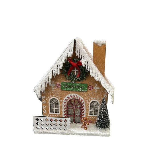 Illuminate your holiday season with our Gingerbread Christmas Bakery LED Decoration. The charming design and bright LED lights create a cozy atmosphere, perfect for any festive occasion. Crafted with high-quality materials, this decoration will add a sweet touch of holiday cheer to your home.