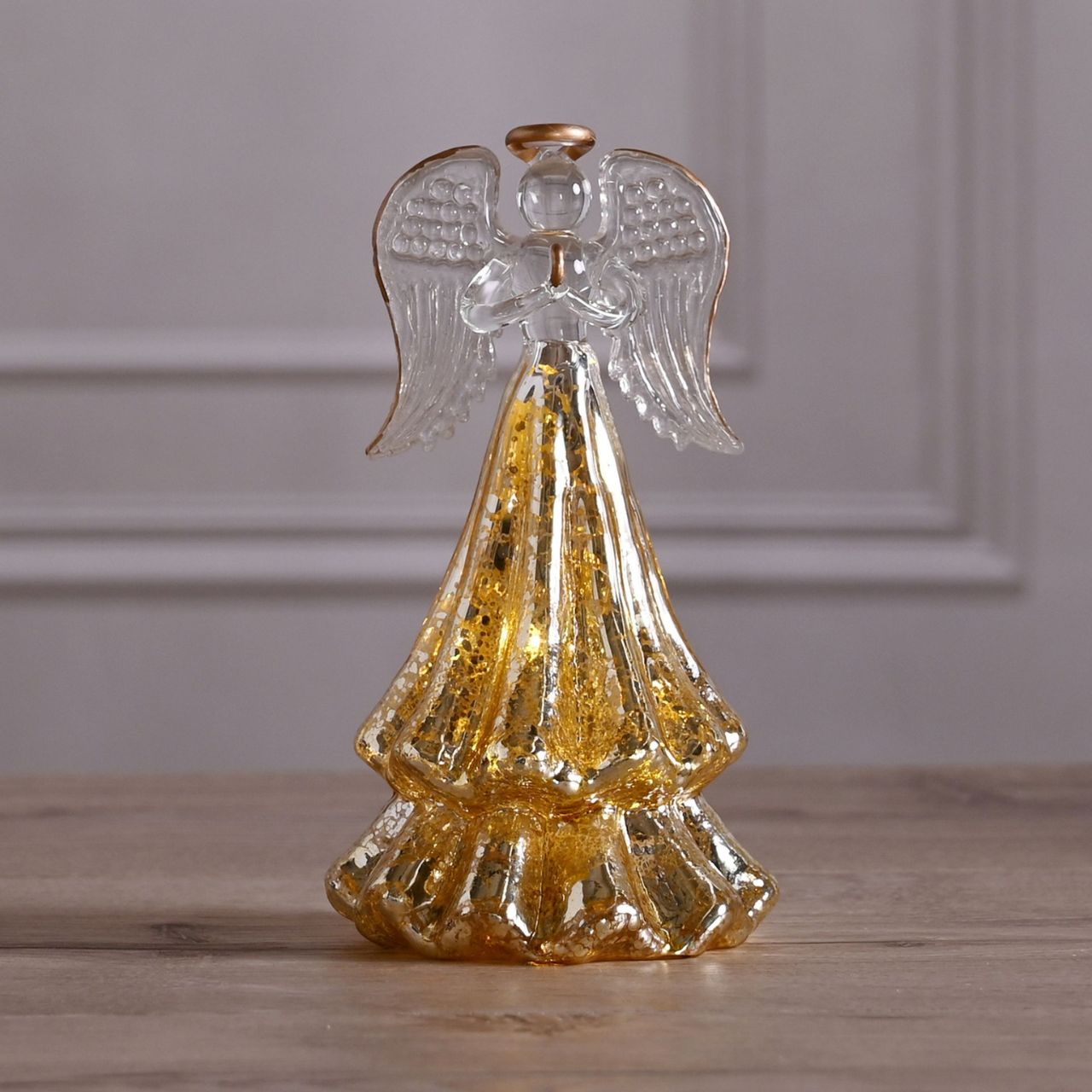 Gold Crackle Effect Glass Angel LED Light A gold crackle effect glass angel LED light decoration by THE SEASONAL GIFT CO. This divine angel provides gorgeous decoration for Winter Wonderlands at home.