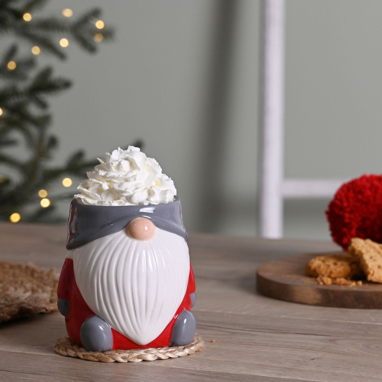 Gonk Christmas Mug A gonk mug by THE SEASONAL GIFT CO. This adorably festive mug makes the perfect home for hot drinks throughout the Christmas season.
