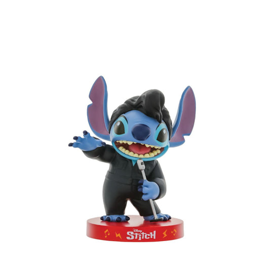 Inspired by Elvis Presley's iconic 1968 comeback special leather suit, Grand Jester Studios presents this vinyl Stitch decked out in black performing into a metallic microphone.