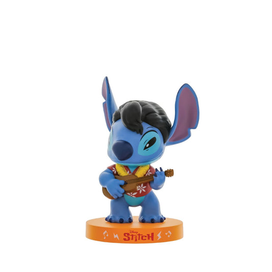 Inspired by Elvis Presley's Blue Hawaii, Grand Jester Studios presents this vinyl Stitch decked out in the red Hawaiian print shirt, yellow lei and ukulele.