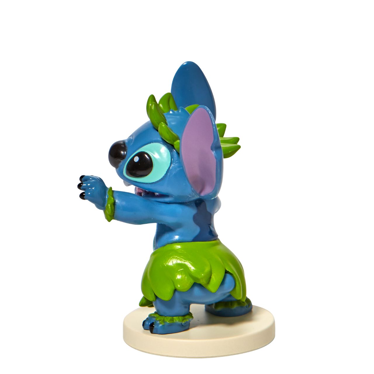 Grand Jester Studios Dancing Stitch Mini Figurine This cute and fun dancing Stitch mini figurine by Grand jester Studios is the perfect addition to any Stitch or Disney collection. Dressed in his finest grass skirt, Stitch is ready to show off his dancing skills at the luau.