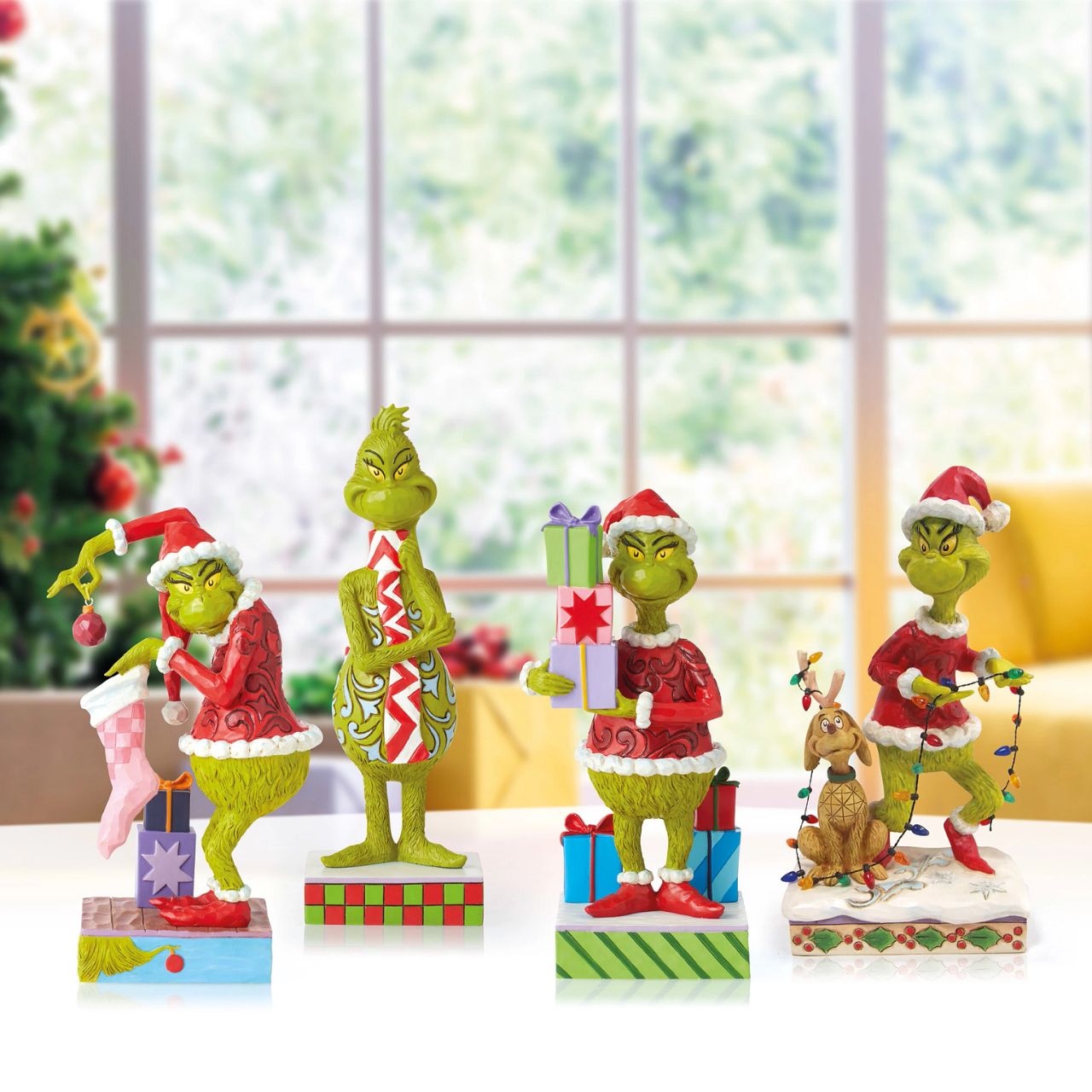 Grinch and Max Tiptoeing Wrapped in Lights Figurine Sneaking across Whoville on Christmas Eve, The Grinch and Max manoeuvre through decorations and lights to unsuspecting chimneys all across town. On a mission to steal Christmas, the conspiring Grinch wears a mischievous grin as he trips around lights in this delightful Jim Shore collectable.