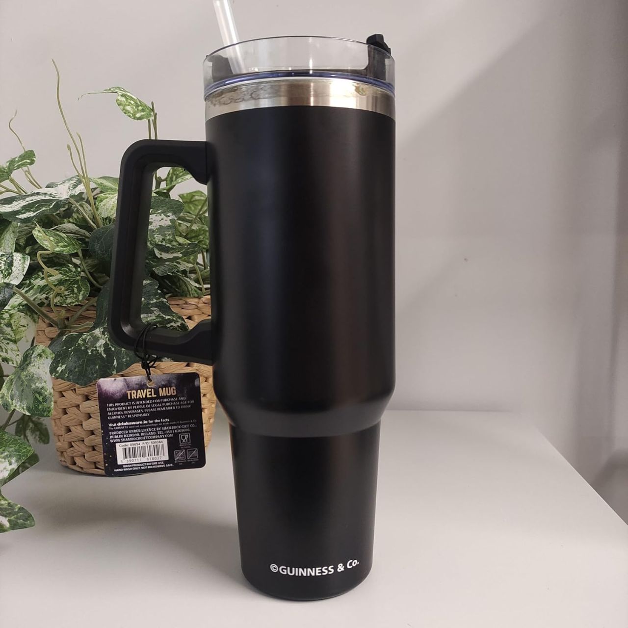 Premium travel cup featuring the iconic Guinness harp logo, celebrating the heritage of Ireland's beloved stout.