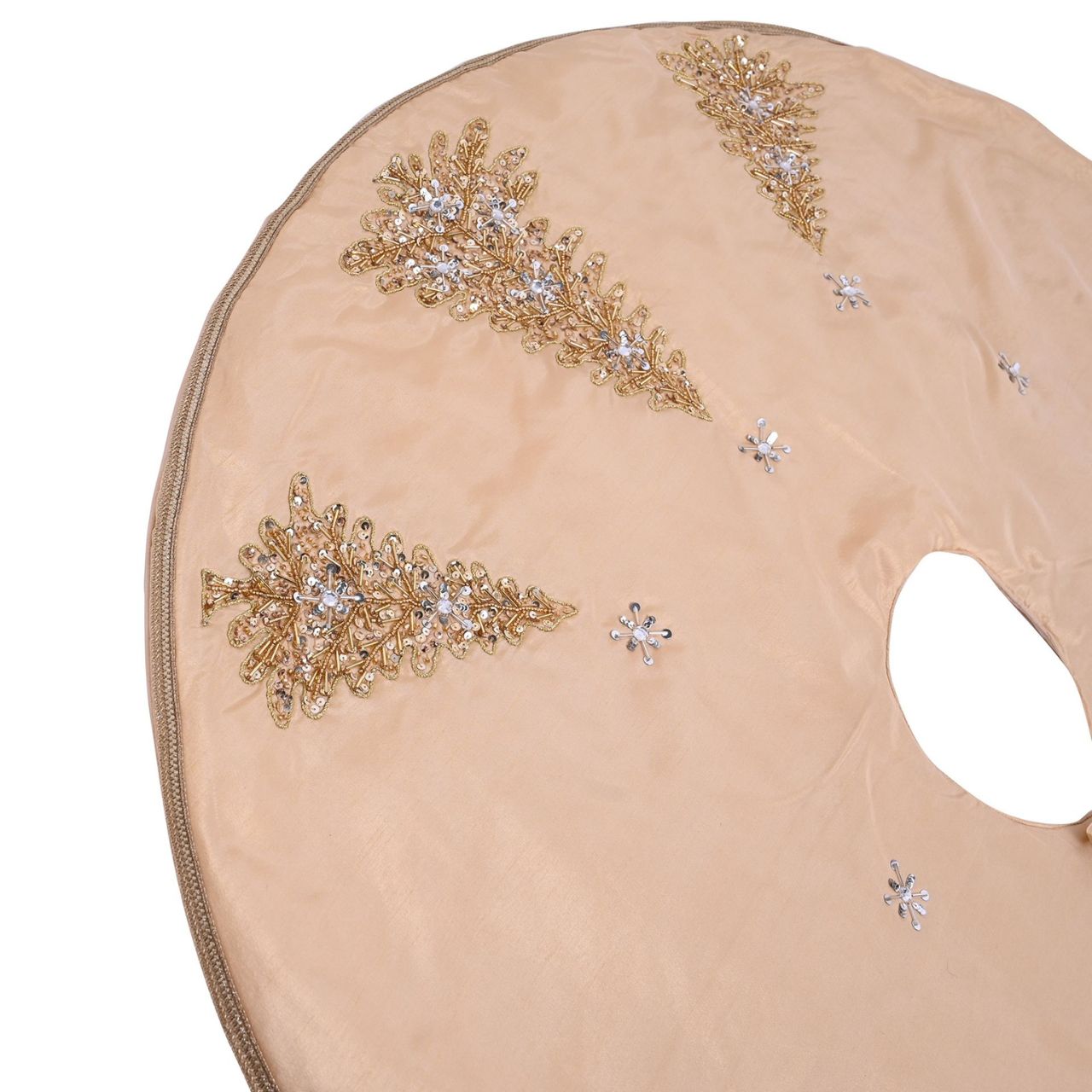 Hand Embellished Gold Sequin Christmas Tree Skirt A hand embellished gold sequin Christmas tree skirt from THE SEASONAL GIFT CO. This standout accessory wraps itself around Christmas trees to accentuate its decoration.
