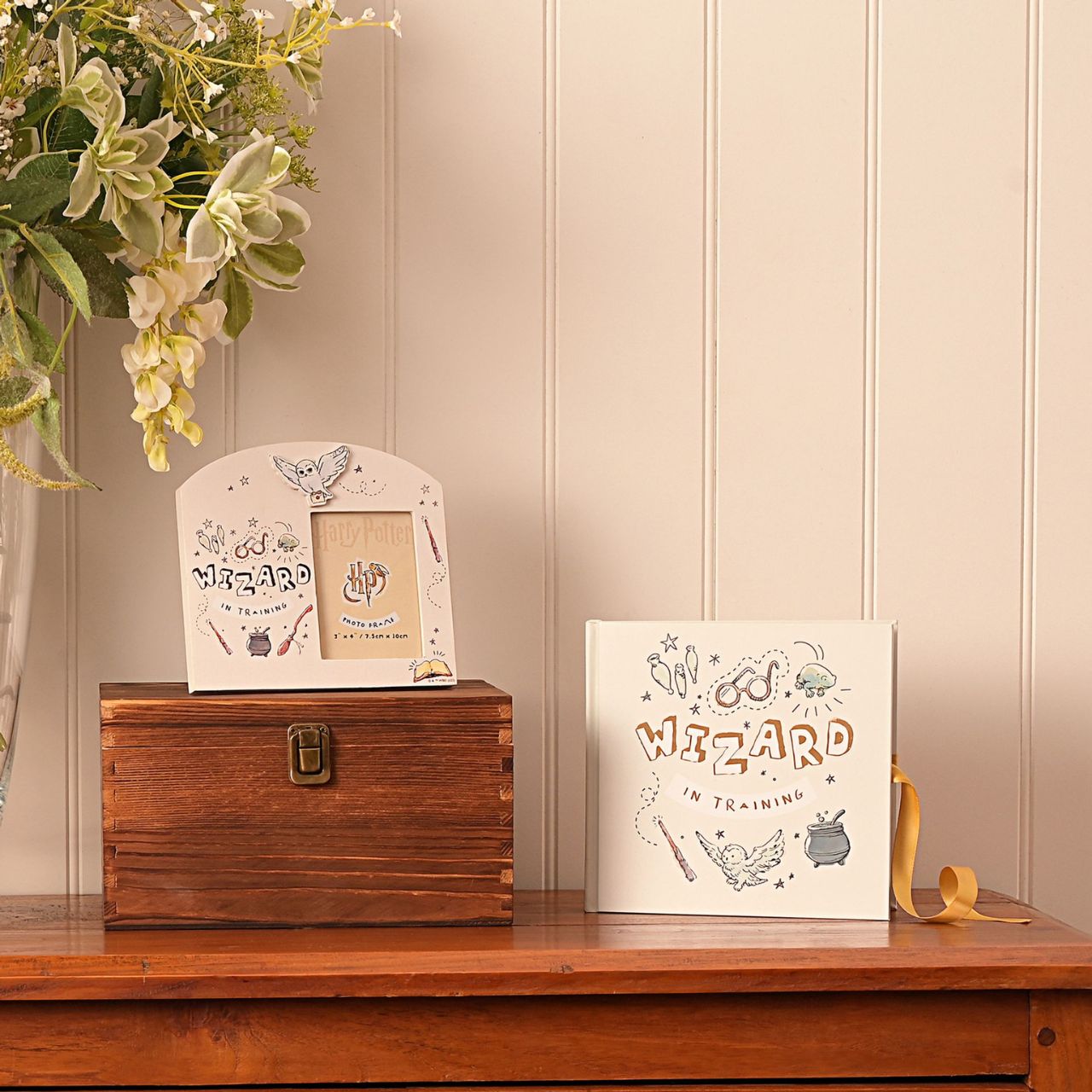 This magical photo album is perfect for presenting photographs of young wizards.