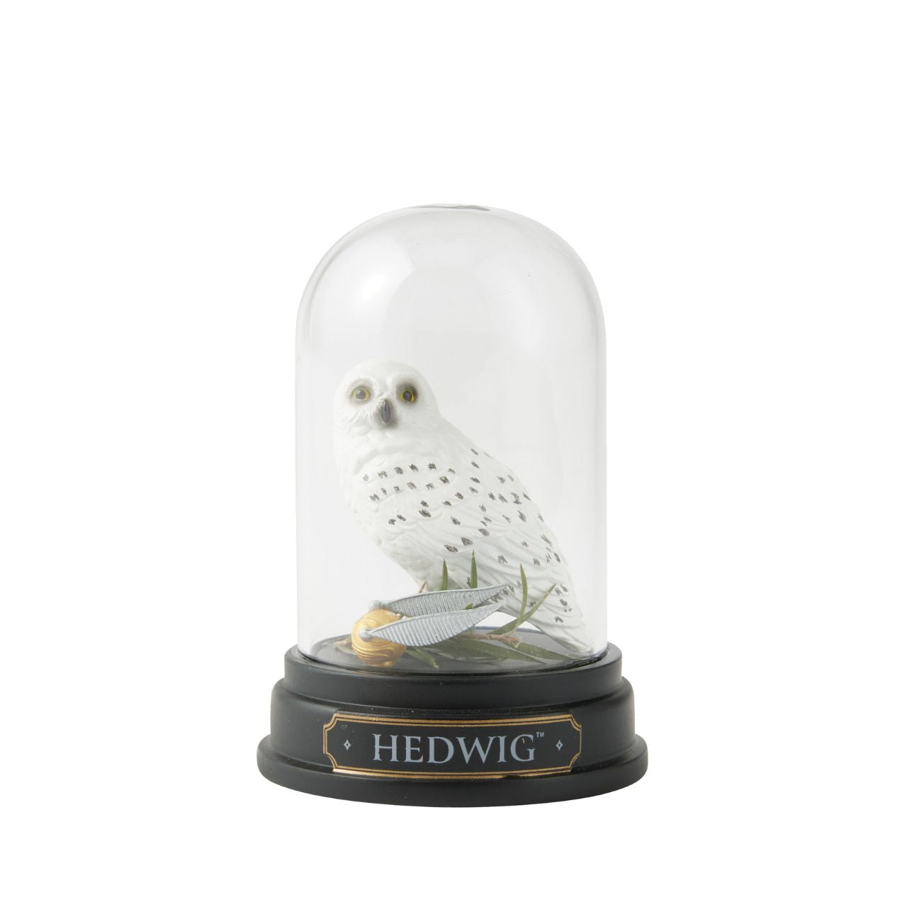 Owl enthusiasts and Harry Potter fans alike will be mesmerized by this graceful, sculpted and hand-painted miniature rendition of Harry's loyal companion nestled under a glass dome.