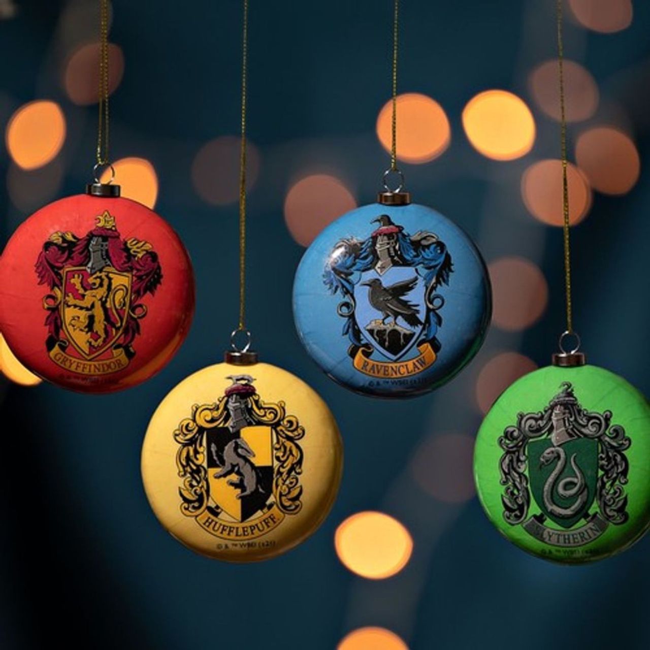 Add a magical touch to your Christmas tree with these vibrant, flat baubles. Whether you're a wizard or witch in the making, featuring all four houses, this set of four decorations is perfect for any Hogwarts-loving home!
