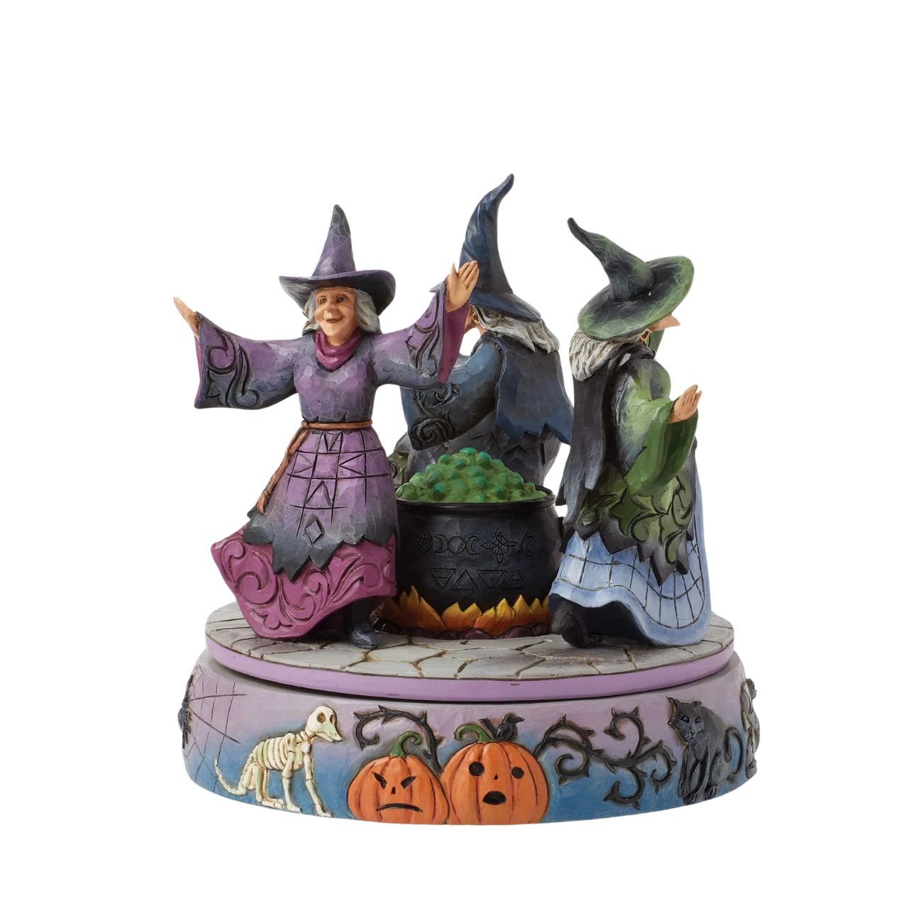 Enter the world of Halloween with this hand-touch rotation Jim Shore movement figurine featuring two witches dancing around a bubbling cauldron. Adorned with jack-o-lanterns, skeletons, tombstones, spiders, snakes, black cats, and bats, it's a bewitching scene.
