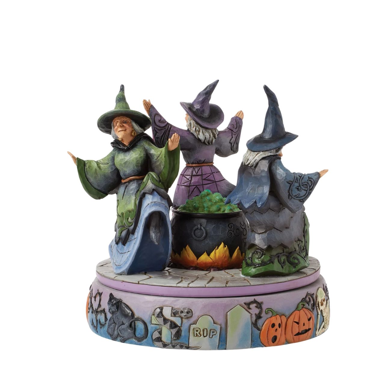 Enter the world of Halloween with this hand-touch rotation Jim Shore movement figurine featuring two witches dancing around a bubbling cauldron. Adorned with jack-o-lanterns, skeletons, tombstones, spiders, snakes, black cats, and bats, it's a bewitching scene.