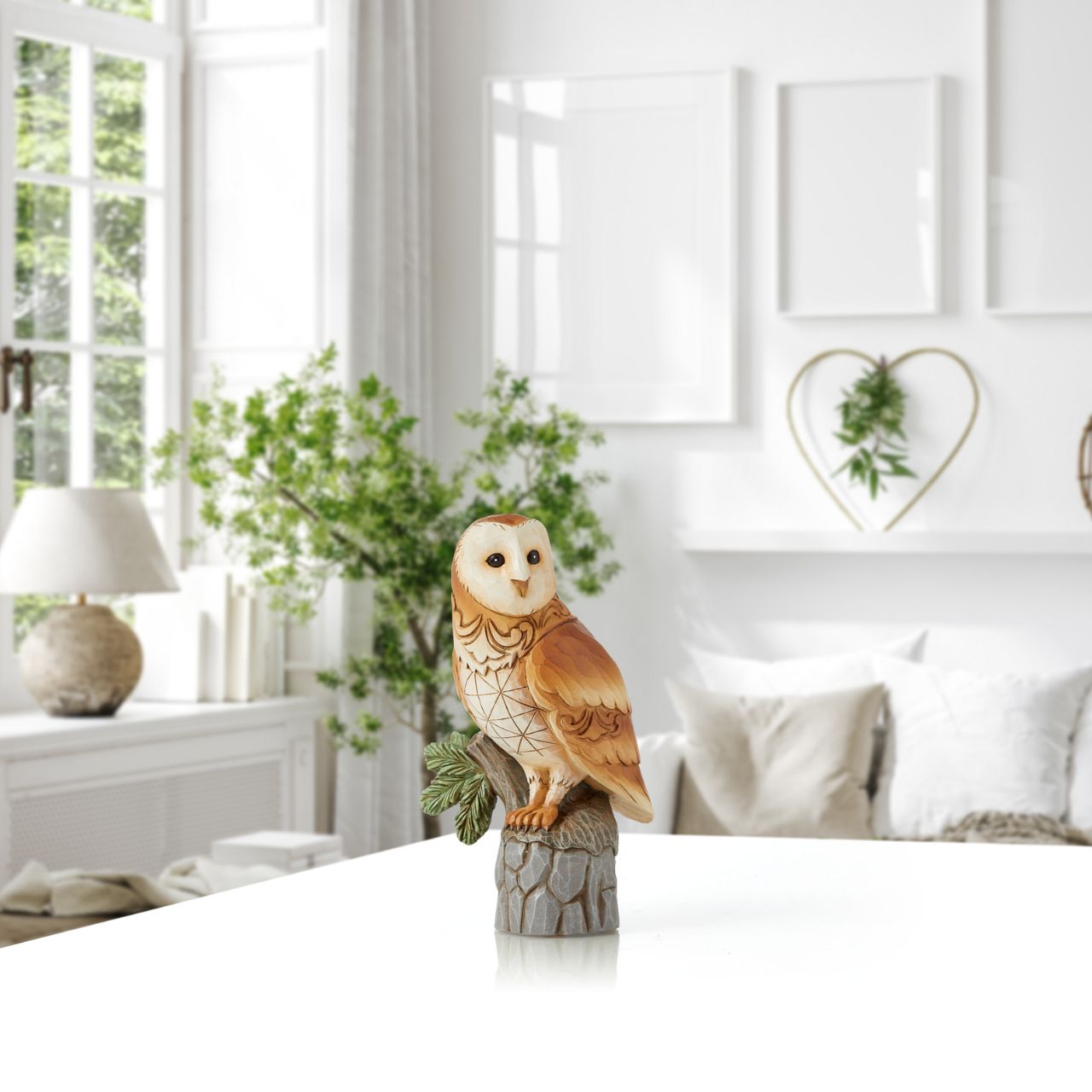 The stunning Barn Owl has a stark white heart-shaped face and matching plumage. With a magnificent wingspan, they are totally silent while in flight. Take the magic of this stunning creature home with this striking figurine miniature by Jim Shore.