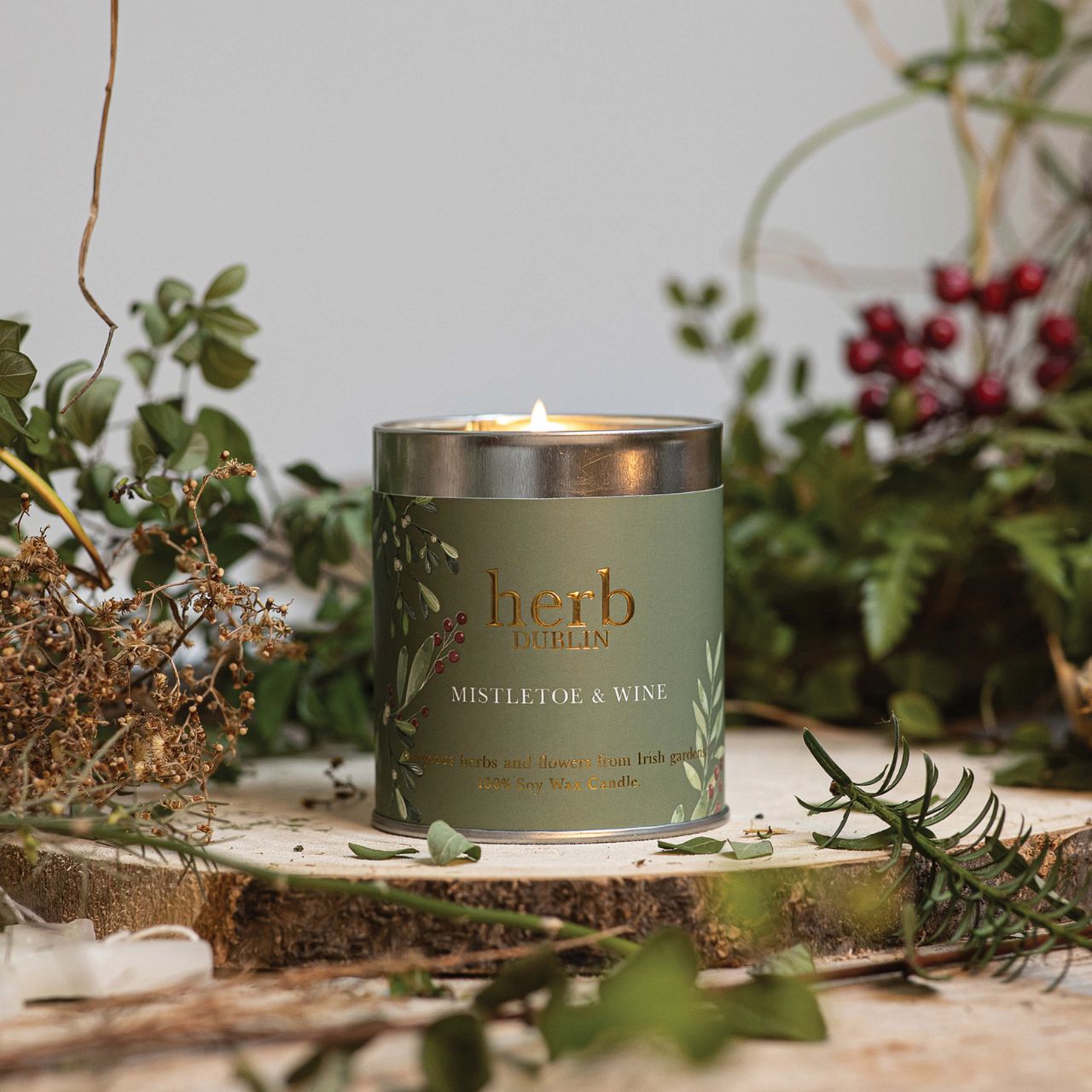 Experience the warmth of the holidays with our Christmas Mistletoe & Wine Tin Candle. This delightful blend of festive scents will fill your home with comfort and joy.