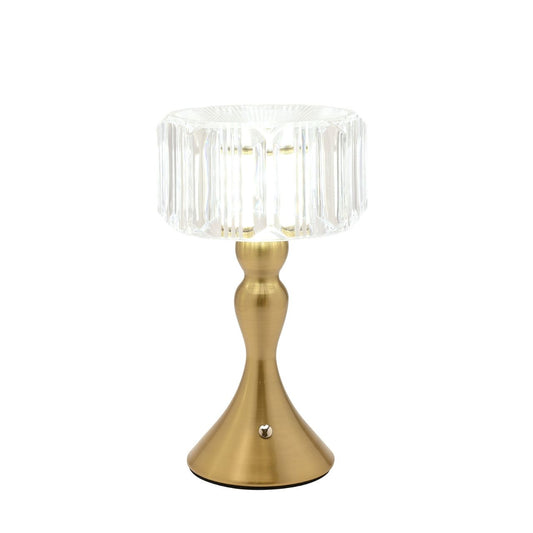 This stylish lamp combines modern design with practicality, boasting a crystal effect shade. The curved bronze base adds a touch of elegance, making it a perfect addition to contemporary interiors.