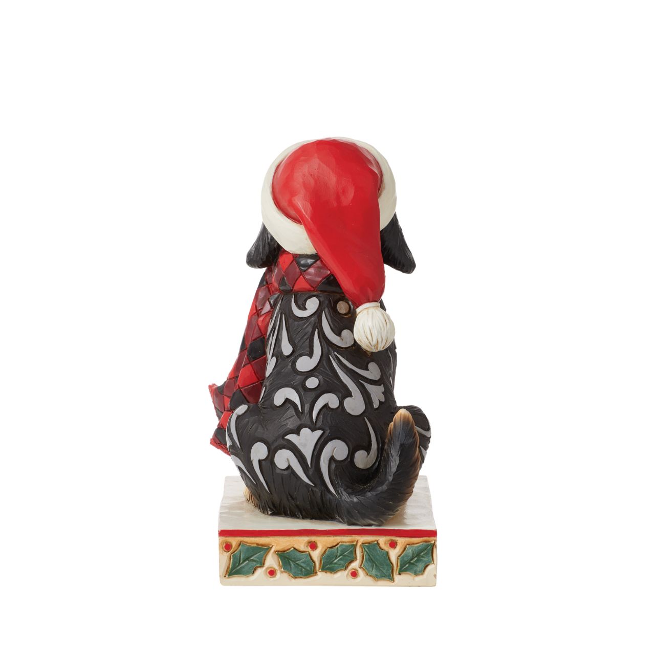 Heartwood Creek Highland Glen Dog in Santa Hat Figurine Designed by award winning artist Jim Shore as part of the Heartwood Creek Highland Glen Collection, hand crafted using high quality cast stone and hand painted, this cute & cosy dog is perfect for the Christmas season.