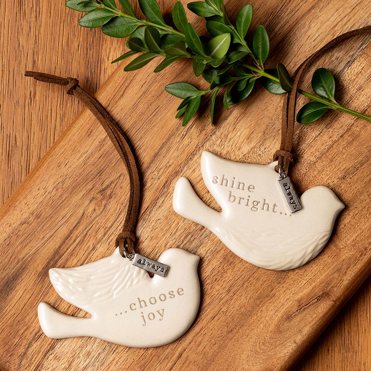 Hope One to Keep, One to Share Ornament Set  The Meaningful Moments collection helps you mark and celebrate the special moments in life. The Hope One to Keep, One to Share Ornaments Set are reminders of love that go with both the giver and receiver wherever they go. Made of stoneware. Buy to share with anyone you know whom you want to see reach for the stars.