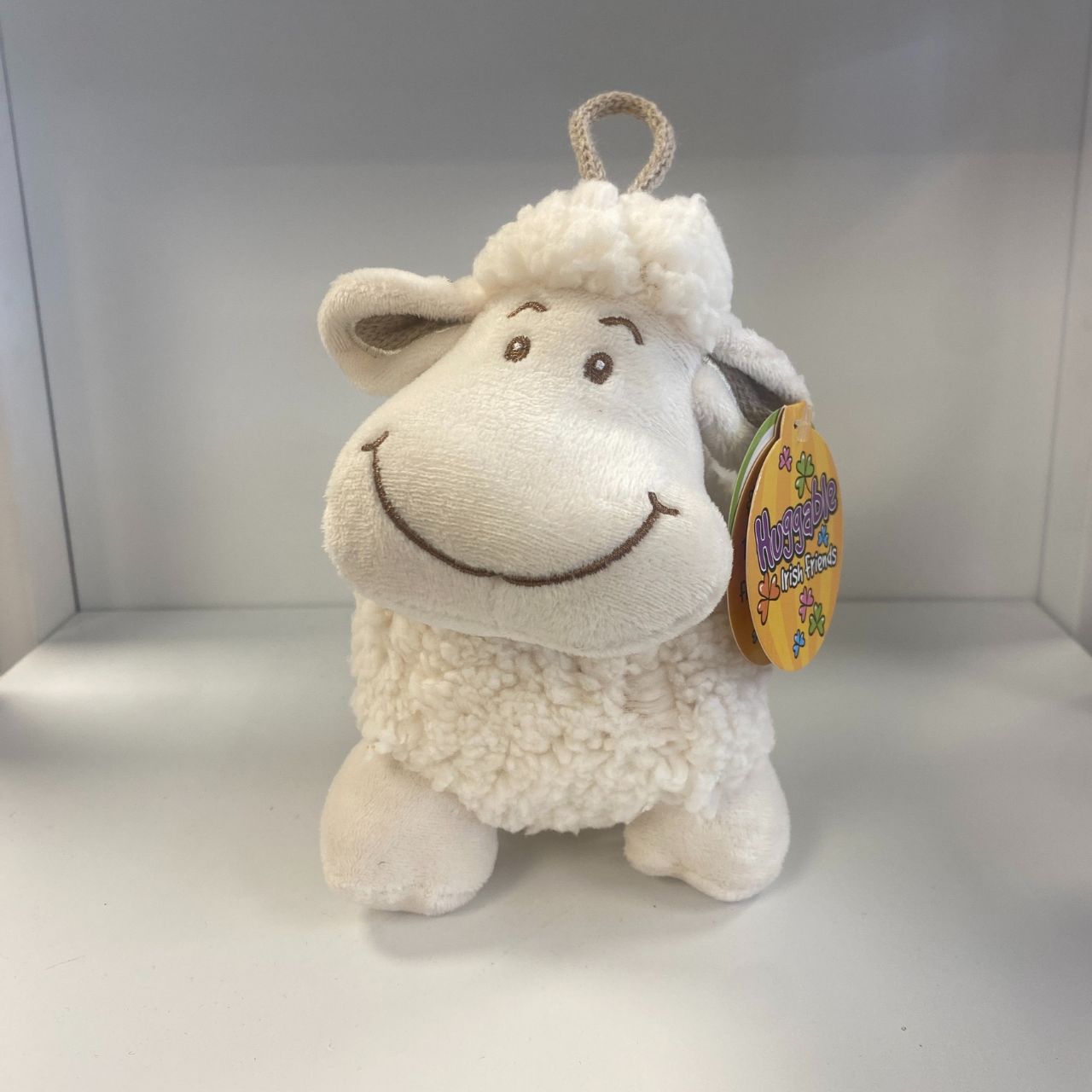 This huggable sheep is designed to provide comfort and relaxation. With its soft and plush material, it is perfect for cuddling up after a long day. Its adorable design adds a touch of cuteness to any room. Made with high-quality materials, it is durable and long-lasting.