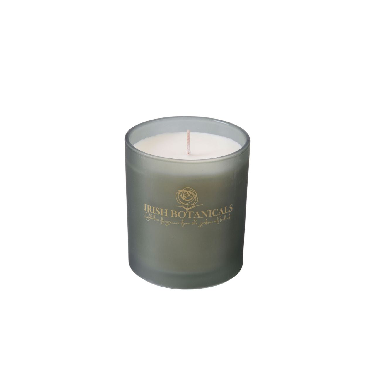 Experience the serene elegance of the Irish Botanicals White Christmas Candle, designed to fill your home with a refined festive ambiance.