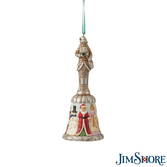 Jim Shore Heartwood Creek 20th Anniversary Bell Ornament  This elegant bell celebrates 20 years of designs with an emerald green crystal in Santa's hand and a platinum painted finish. The hanging bell makes a lovely addition to any Christmas tree and rings in another year of Jim Shore creations.