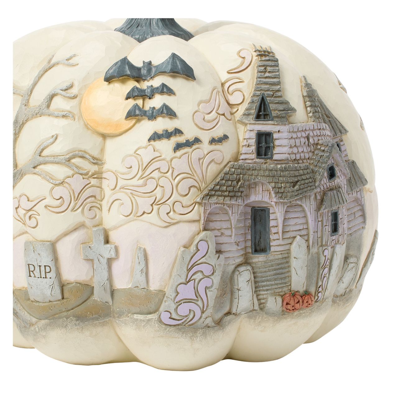 Capture the spirit of Halloween with this eerie Jim Shore pumpkin figurine, showcasing a haunted graveyard scene complete with a spooky haunted house, flying bats, and a full moon. With intricate details and haunting ambiance, prepare to scare.