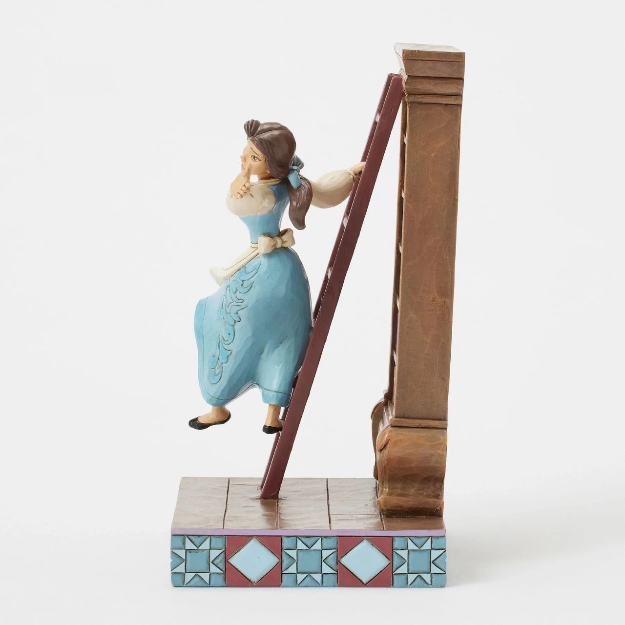 Celebrating the 35th anniversary of Beauty and the Beast in 2025, this lively Jim Shore scene captures Belle in her beloved library, singing as she glides gracefully on the bookshelf ladder. The gorgeous scene delights with exquisite rosemaling details.