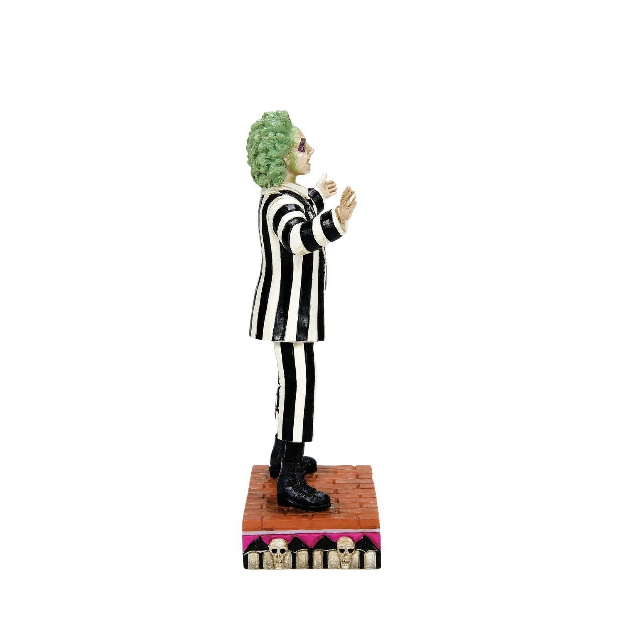 Beetlejuice, Beetlejuice, Beetlejuice... He's here. The iconic bio-exorcist from the 1988 Tim Burton film has arrived and this time, he has a Jim Shore twist. Crafted from high quality cast stone and hand-painted, this figurine features the main (dead) man himself in his classic black & white striped suit, ready to get to work ridding your home of the pesky living.