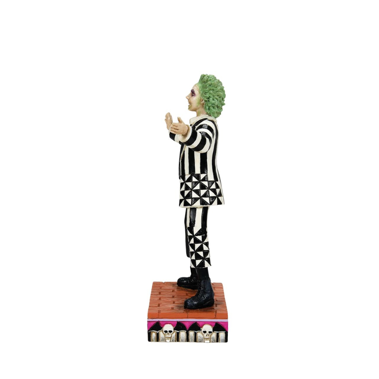 Beetlejuice, Beetlejuice, Beetlejuice... He's here. The iconic bio-exorcist from the 1988 Tim Burton film has arrived and this time, he has a Jim Shore twist. Crafted from high quality cast stone and hand-painted, this figurine features the main (dead) man himself in his classic black & white striped suit, ready to get to work ridding your home of the pesky living.