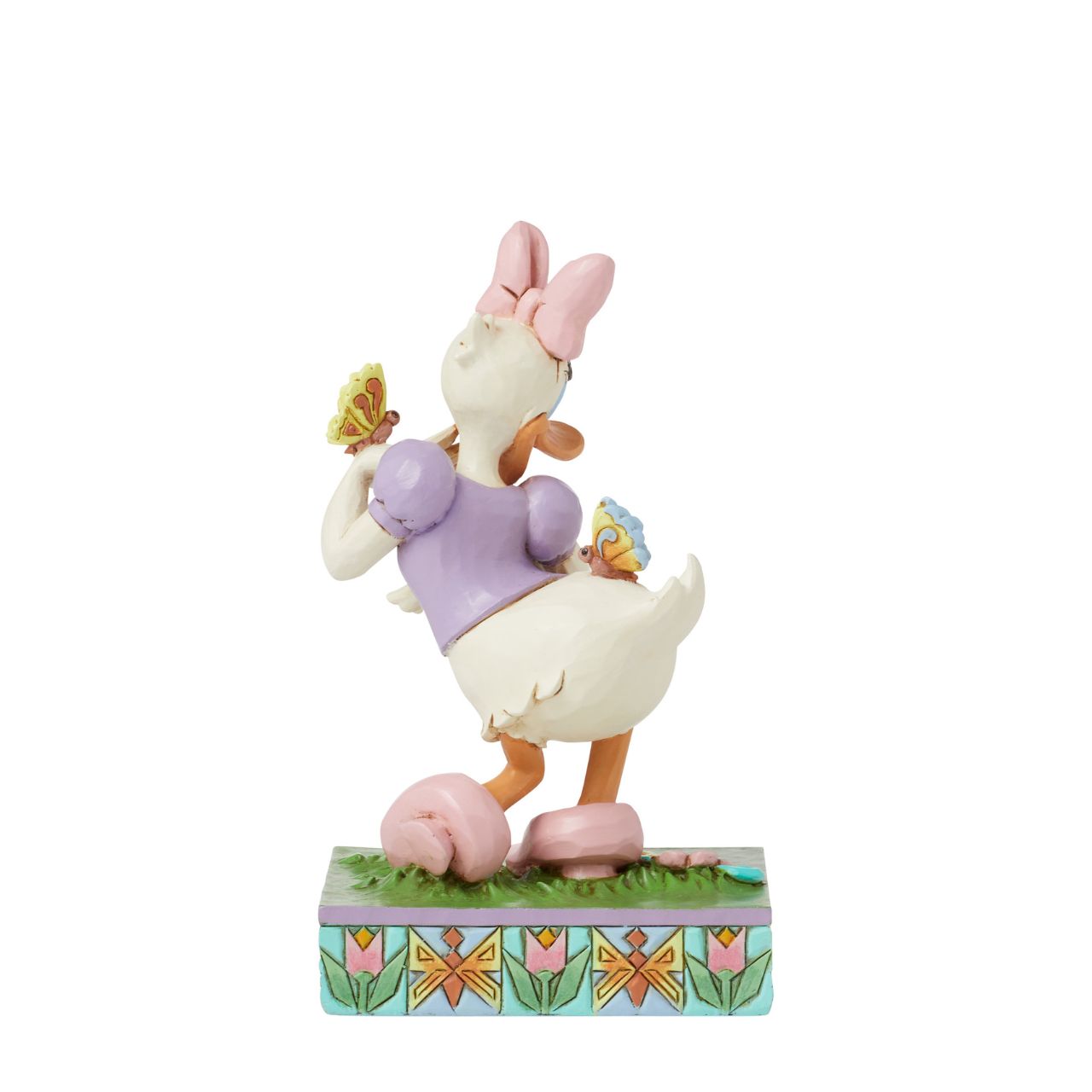 Donald Ducks super cute girlfriend Daisy Duck is here to celebrate the joy of Spring. Hand crafted and painted, she is part of the Disney Traditions collection by Jim Shore. Comes in a fully branded gift box.