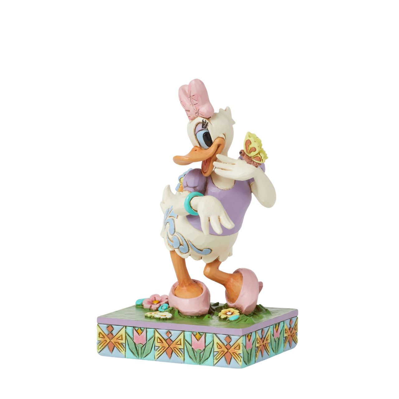 Donald Ducks super cute girlfriend Daisy Duck is here to celebrate the joy of Spring. Hand crafted and painted, she is part of the Disney Traditions collection by Jim Shore. Comes in a fully branded gift box.