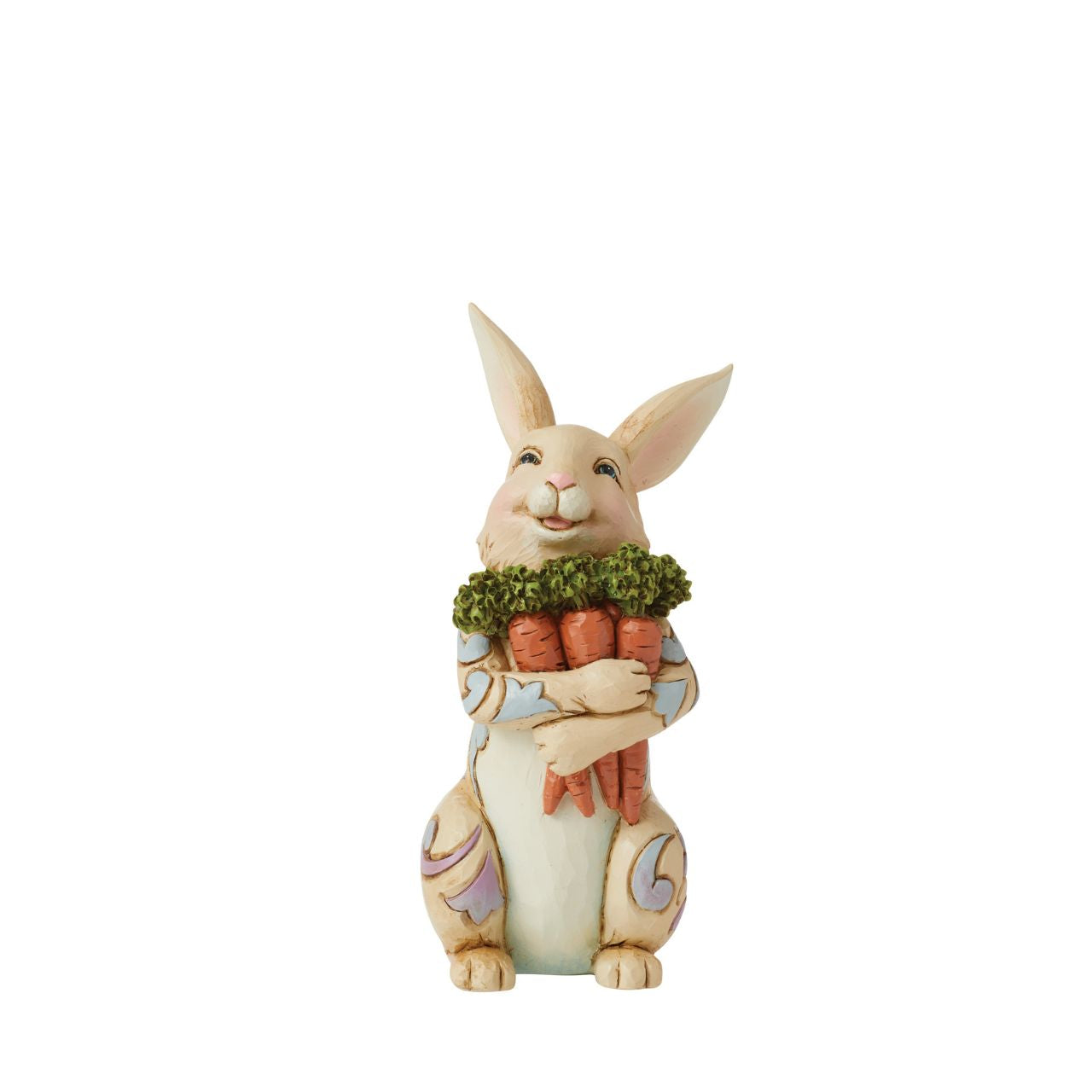 With an arm full of carrots, this cheerful Pint bunny is ready for Easter| Colourful blue and purple rosemaling on his fur, this fluffy Jim Shore rabbit figurine is a delightful edition to your Springtime home décor.