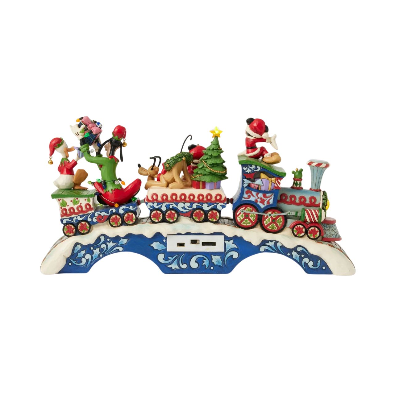This fantastic Jim Shore Mickey Mouse Express chugs along a snowy track, bringing festive cheer as it lights up and plays eight beloved Christmas tunes. With intricate details, the train showcases Mickey and his friends, trees, gifts, and lights.