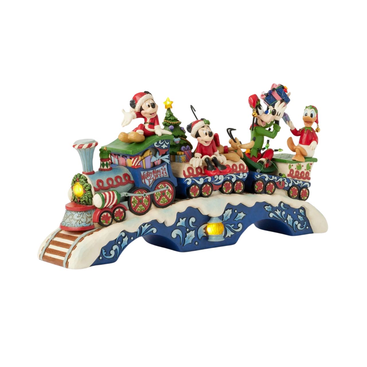 This fantastic Jim Shore Mickey Mouse Express chugs along a snowy track, bringing festive cheer as it lights up and plays eight beloved Christmas tunes. With intricate details, the train showcases Mickey and his friends, trees, gifts, and lights.