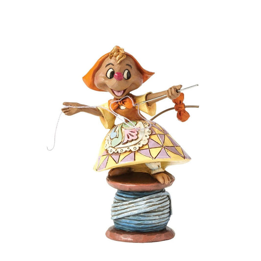 Suzy the seamstress from Disney's Cinderella is happy to lend a helping hand. A great companion piece to the Jaq and Gus clock or as a stand alone figurine. Designed by award winning artist and sculptor, Jim Shore for the Disney Traditions brand.