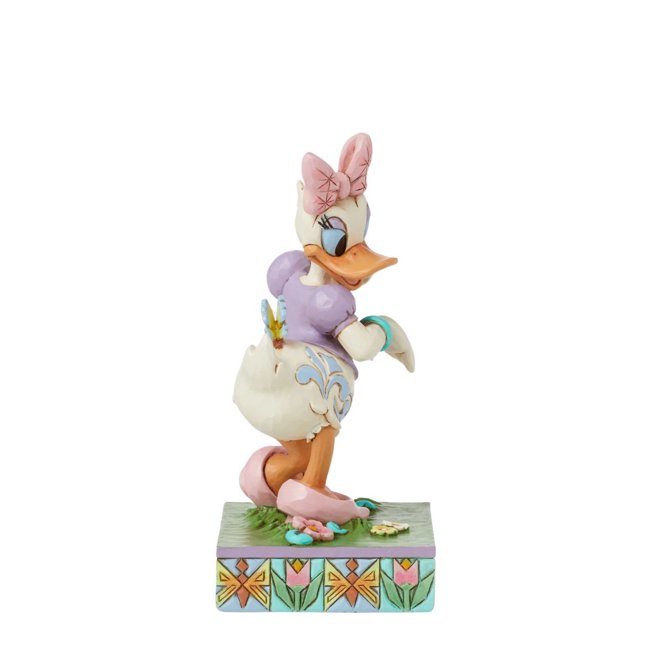 Donald Ducks super cute girlfriend Daisy Duck is here to celebrate the joy of Spring. Hand crafted and painted, she is part of the Disney Traditions collection by Jim Shore. Comes in a fully branded gift box.