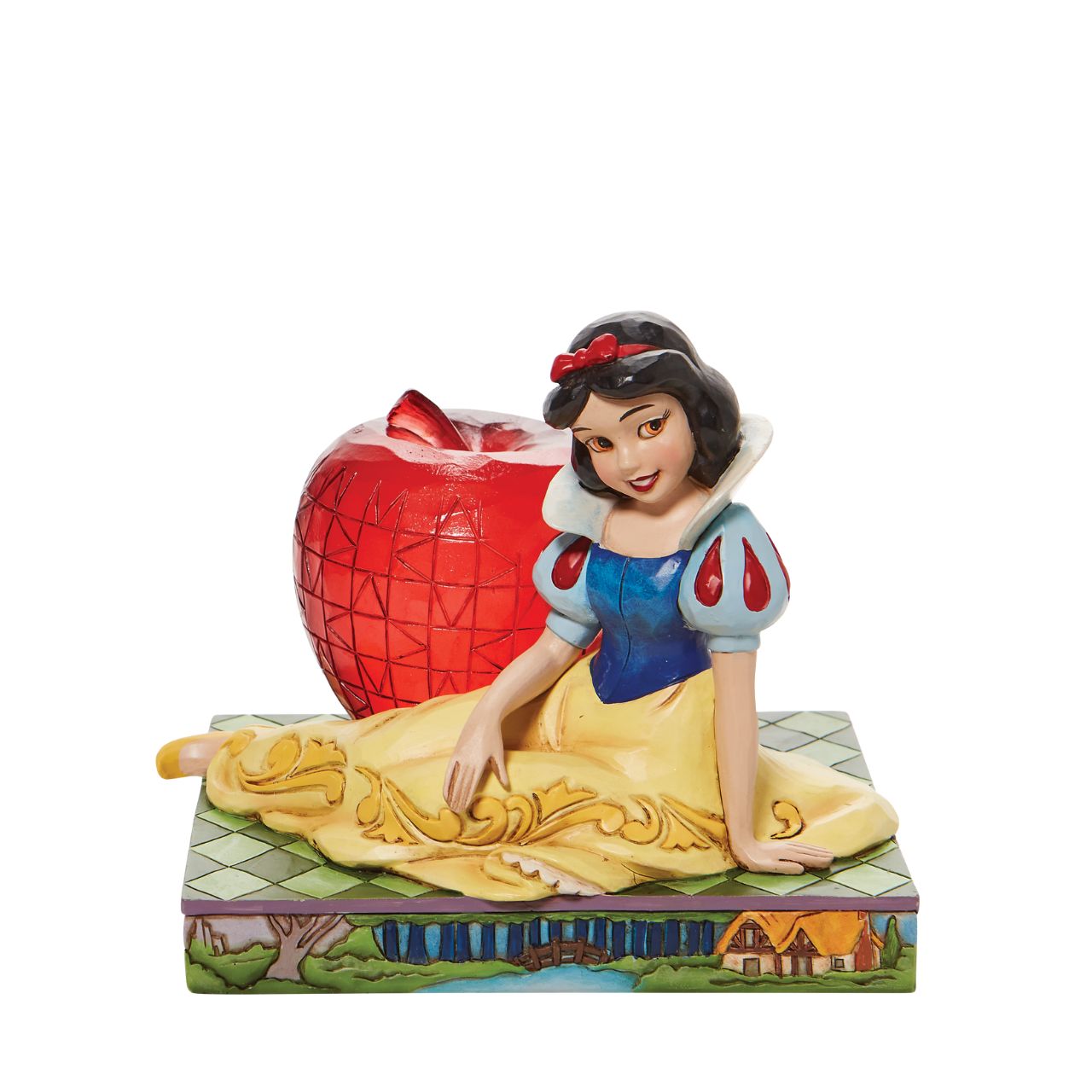 Jim Shore Disney Snow White with Apple Figurine  This Disney Traditions line by Jim Shore features iconic Walt Disney princesses with their famous props. With a base illustrating her story, this piece features Snow White in her famous gown next to a large apple.