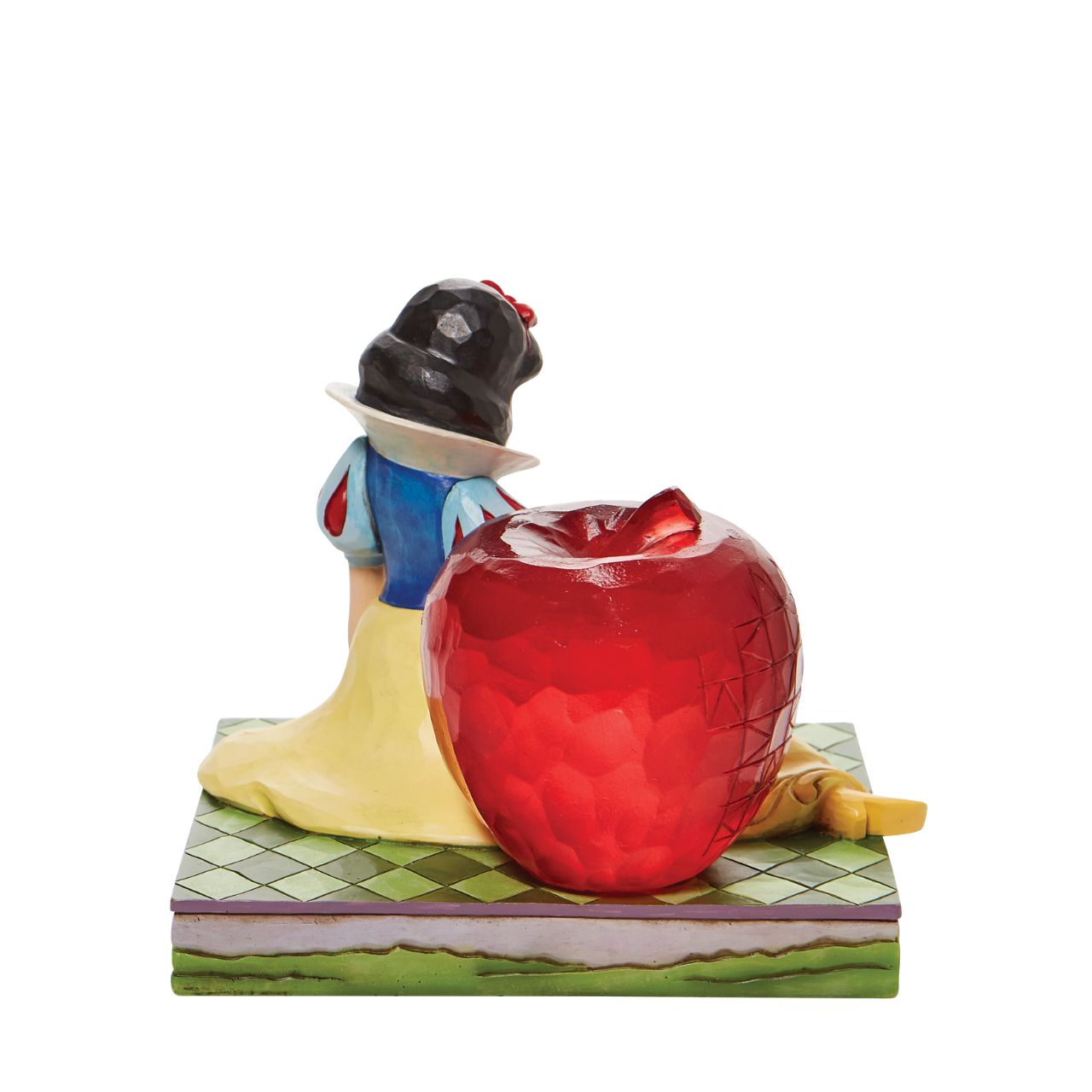 Jim Shore Disney Snow White with Apple Figurine  This Disney Traditions line by Jim Shore features iconic Walt Disney princesses with their famous props. With a base illustrating her story, this piece features Snow White in her famous gown next to a large apple.