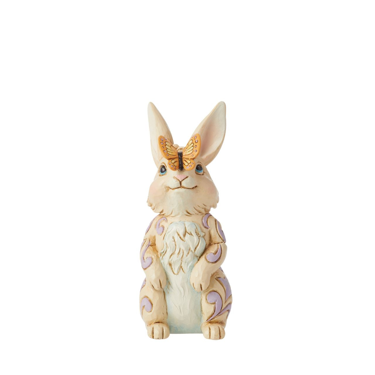 Enchanted by a butterfly resting on its nose, this adorable mini bunny stands tall with gentle sincerity. With delicate purple rosemaling on his fur, this Jim Shore rabbit figurine is sure to inspire smiles this Spring.