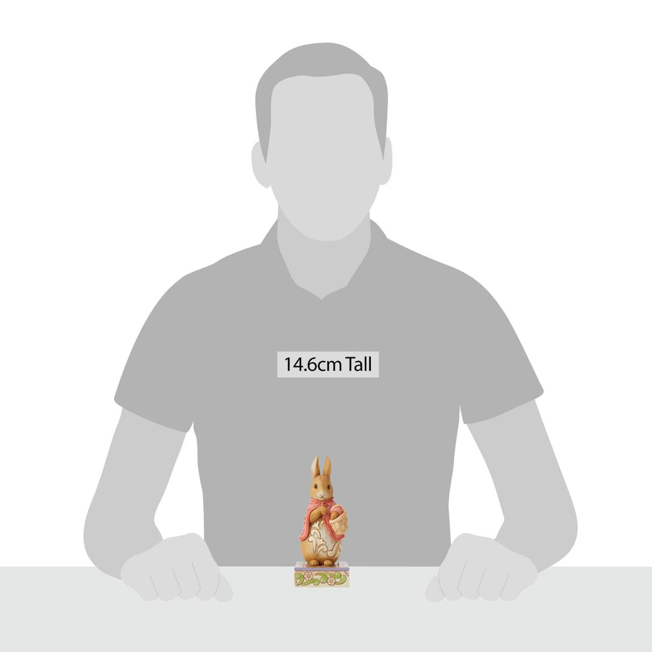 Beatrix Potter Flopsy Good Little Bunny Figurine Award winning folk artist Jim Shore brings his unique style to Beatrix Potter's beloved story, The Tale of Peter Rabbit, through charming hand-crafted gifts that will delight her readers of all ages. This Jim Shore figurine features the ever-so-sweet Flopsy, standing gracefully in her famous pink cape.