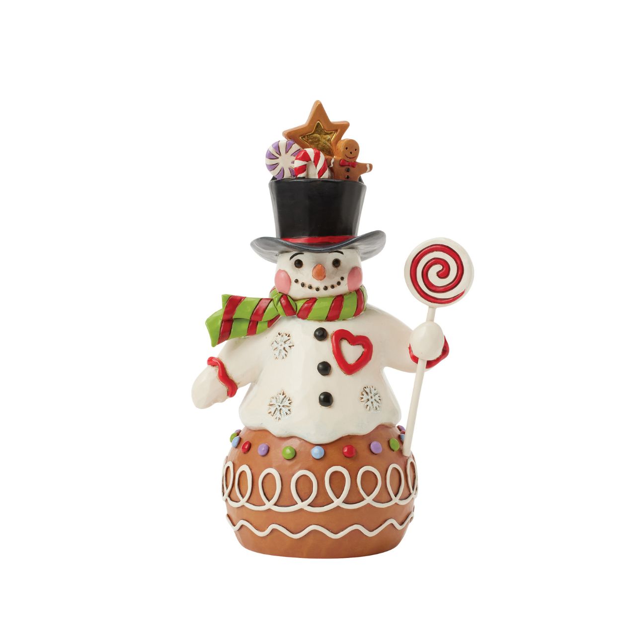 This charming Jim Shore Gingerbread Christmas snowman is too sweet to resist, with icing and candy details decorating his deliciously festive form. Smiling warmly beneath a top hat brimming with sweets, this piece adds a playful touch to your holiday decorations.